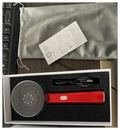 ScalpPulse box and storage bag