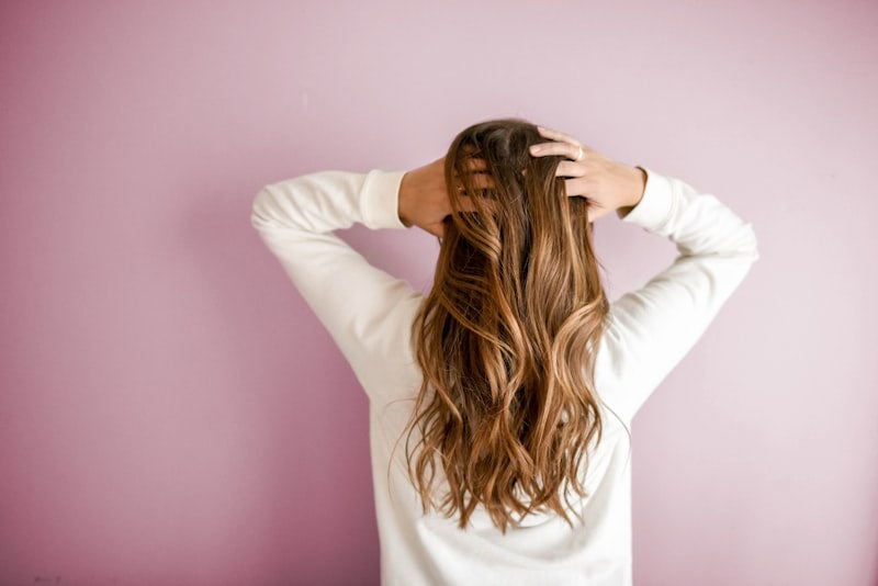 Before: dry damaged frizzy hair — After: silky smooth hydrated hair with Glow Restore Hair Mask